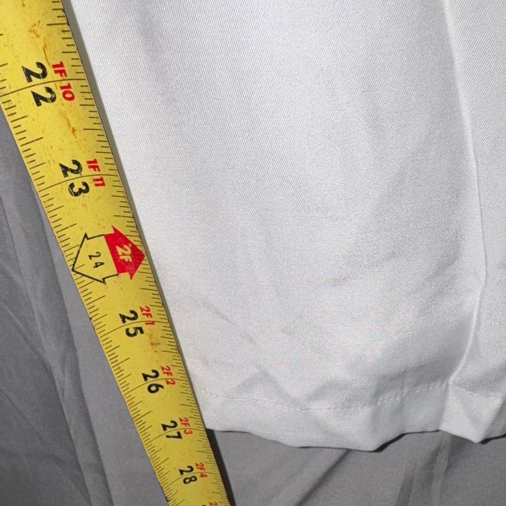 Elegant White Sleeveless Jumpsuit - Picture 10 of 13